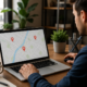 Small business owner improving local SEO using a laptop and location map